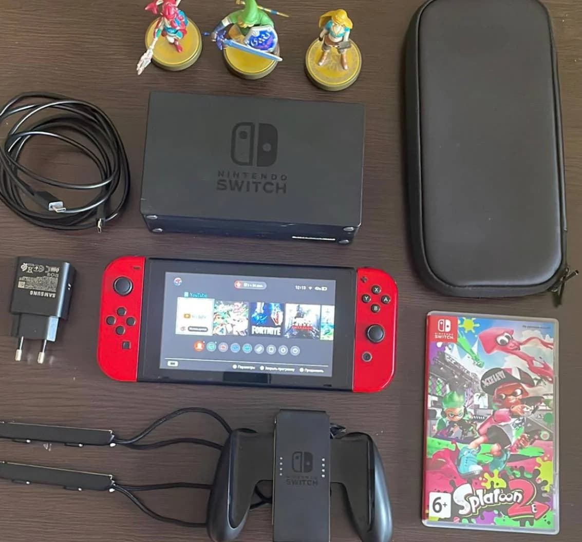 Продам Nintendo Switch (1-е поколение) с красными Joy-Con + игра Splatoon 2. - 1